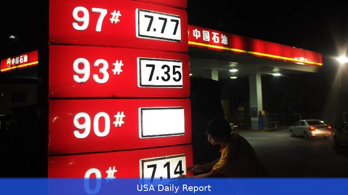 China Cuts Fuel Price Hike Nearly in Half to Ease Pressure on 300 Million Drivers